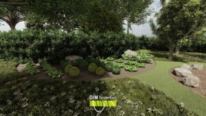 Beplantingsvak met vaste planten en sierkeien in landelijke bostuin